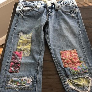 Levi’s boot cut jeans with patches.513